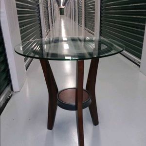 Brown round glass top tables